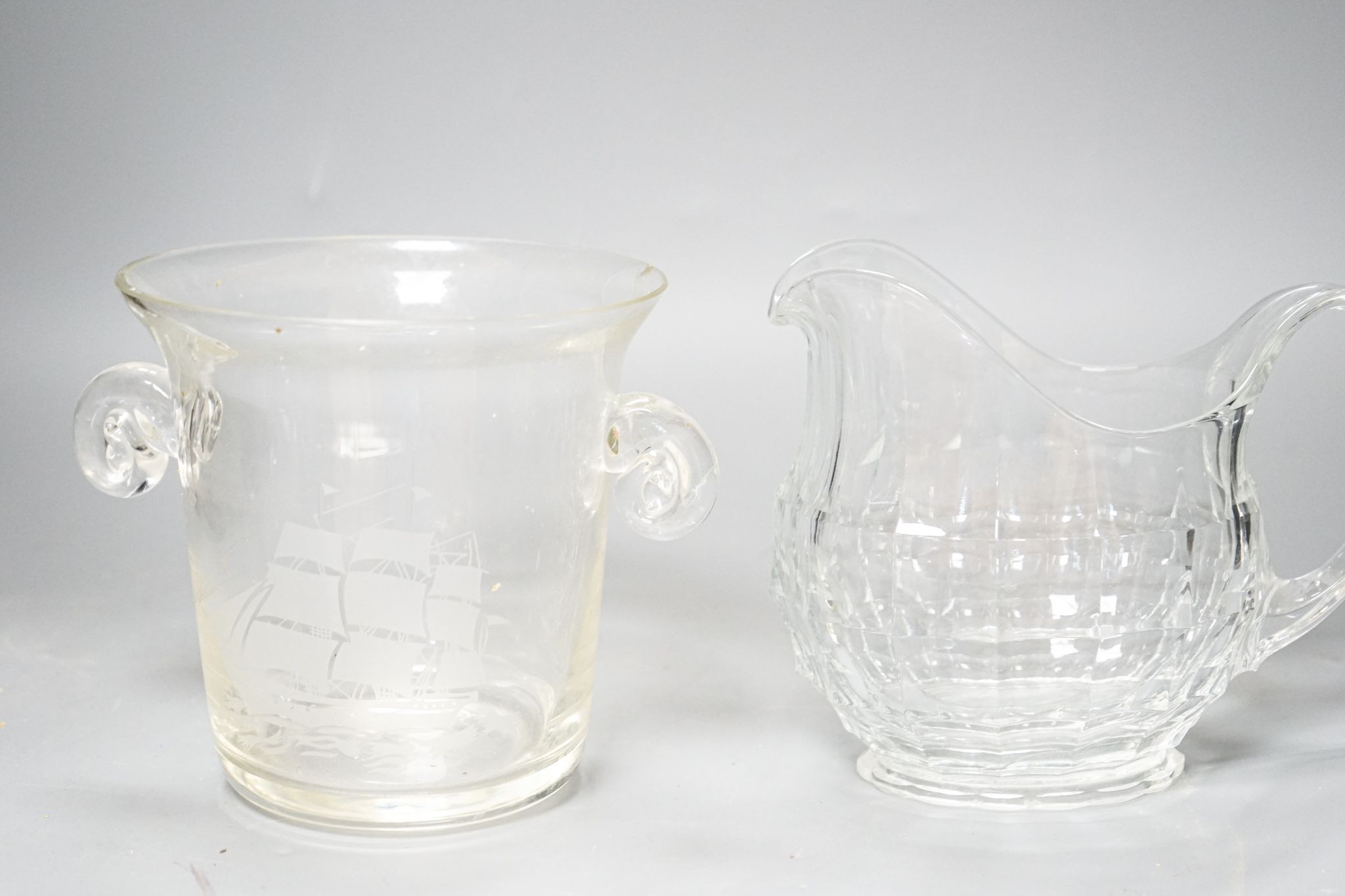 A trio of Colelfax and Fowler clear crystal candlesticks and other clear glasswares, jar height 15cm overall